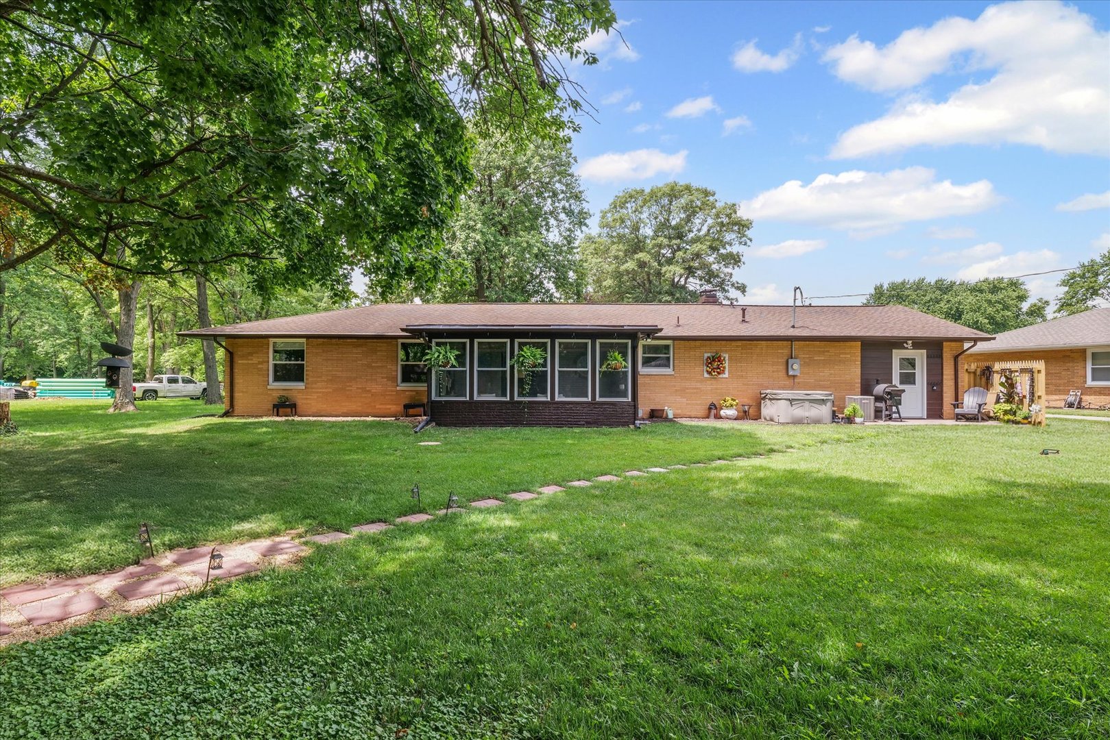 5 Golfview Drive Savoy, IL 61874 - Photo 37 of 42 a front view of a house with a garden