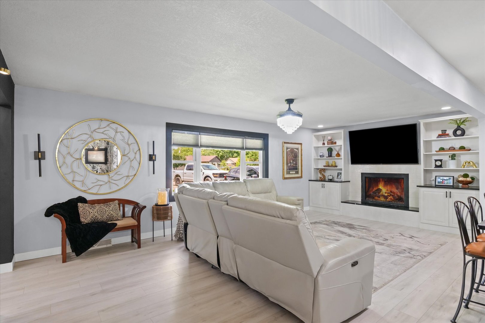 5 Golfview Drive Savoy, IL 61874 - Photo 6 of 42 a living room with furniture a fireplace and a flat screen tv