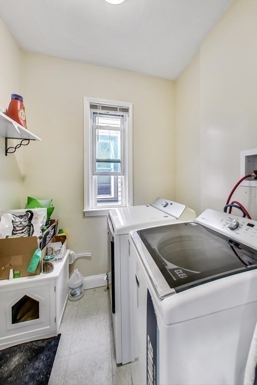 109 Walnut Street Somerville, MA 02145 - Photo 18 of 42 a utility room with dryer and washer