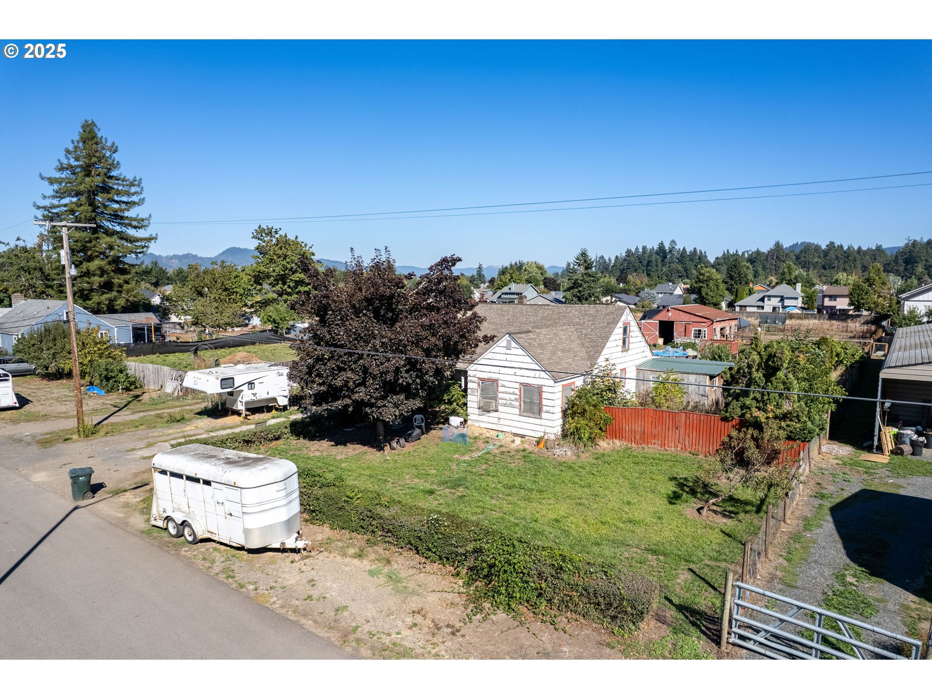 945 South 43rd Street Springfield, OR 97478 - Photo 2 of 15 a bathroom with a sink and a mirror
