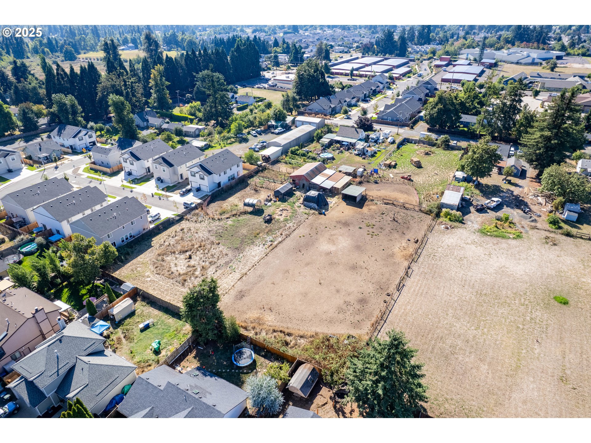 945 South 43rd Street Springfield, OR 97478 - Photo 5 of 15 an aerial view of residential houses with outdoor space