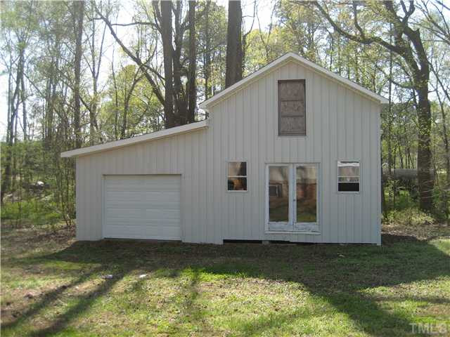 7500 Rock Service Station Road Raleigh, NC 27603 - Photo 17 of 21 Another view of the 24x30 garage/workshop, lots of potential.
