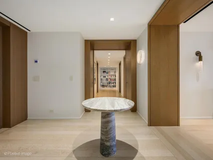 a view of a living room and a flat screen tv