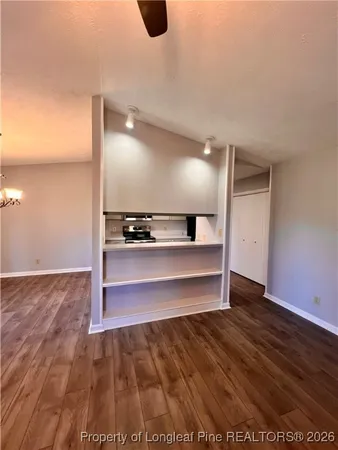 a view of kitchen island with wooden floor
