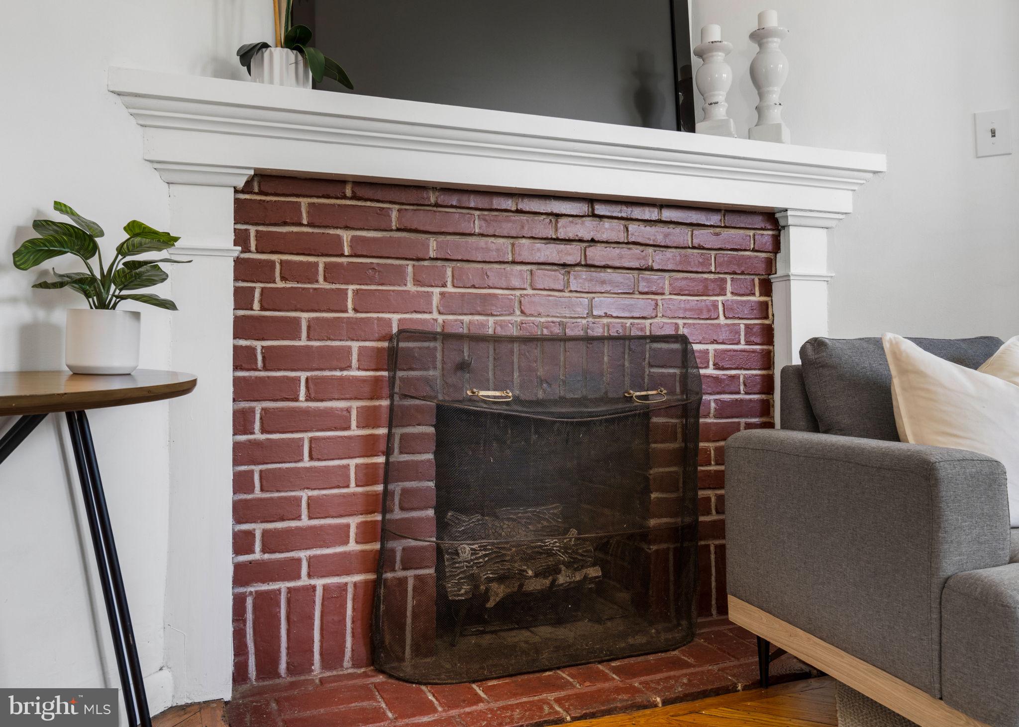 264 Pancoast Avenue Springfield, PA 19064 - Photo 12 of 38 a living room with furniture and a fireplace
