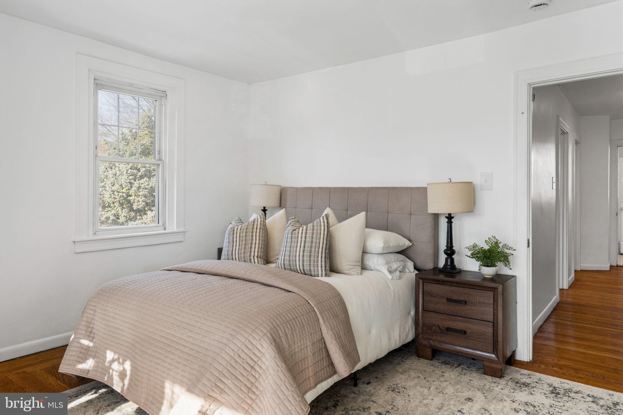 264 Pancoast Avenue Springfield, PA 19064 - Photo 20 of 38 a bedroom with bed and wooden floor