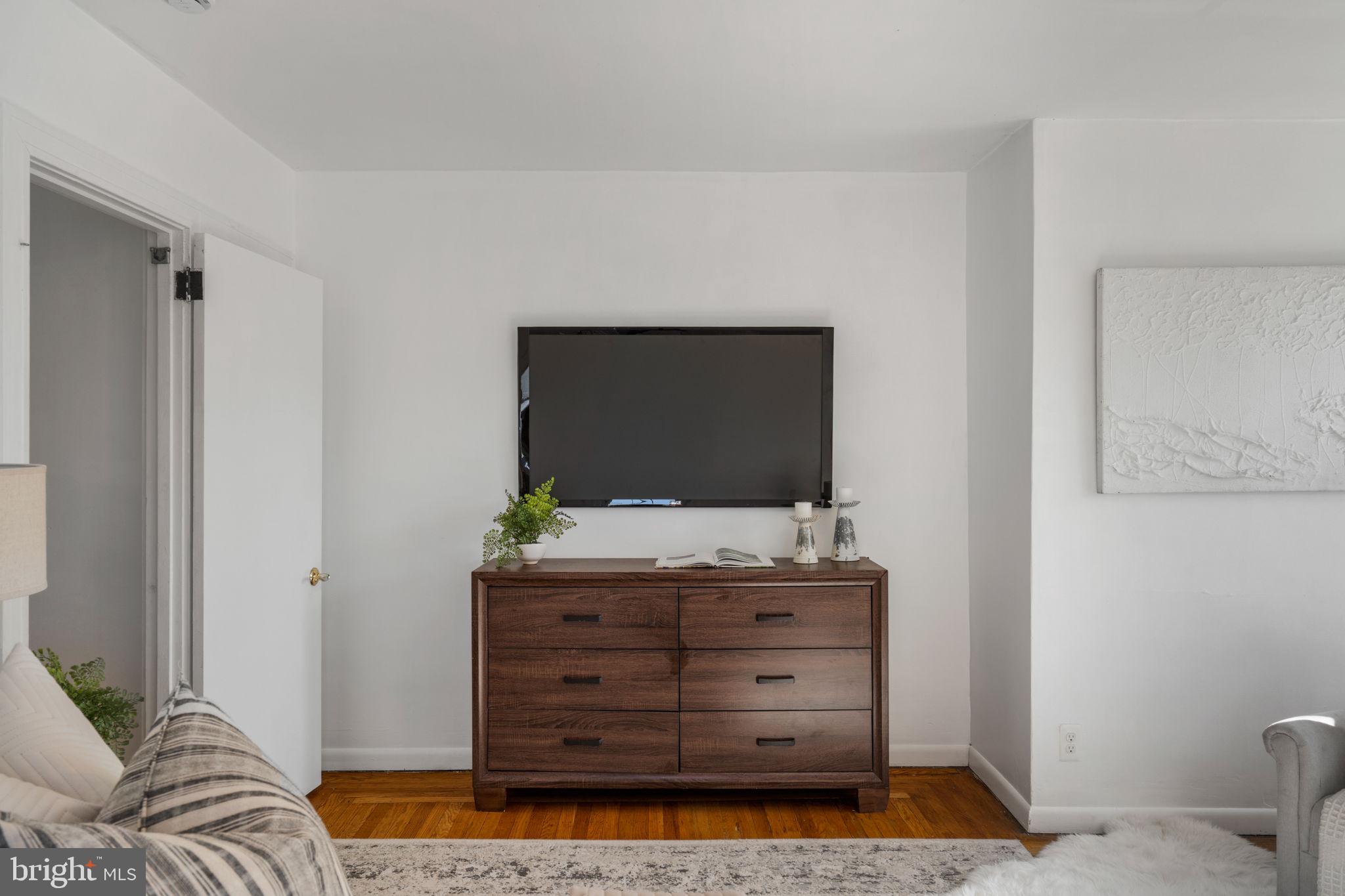 264 Pancoast Avenue Springfield, PA 19064 - Photo 24 of 38 a living room with furniture and a flat screen tv