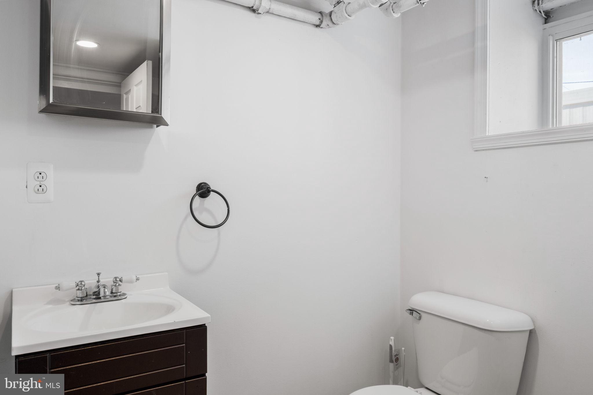 264 Pancoast Avenue Springfield, PA 19064 - Photo 31 of 38 a bathroom with a sink vanity and toilet