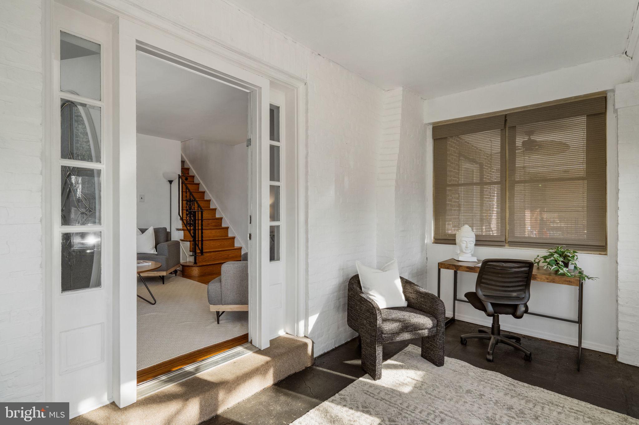 264 Pancoast Avenue Springfield, PA 19064 - Photo 4 of 38 a workspace with wooden floor and a window