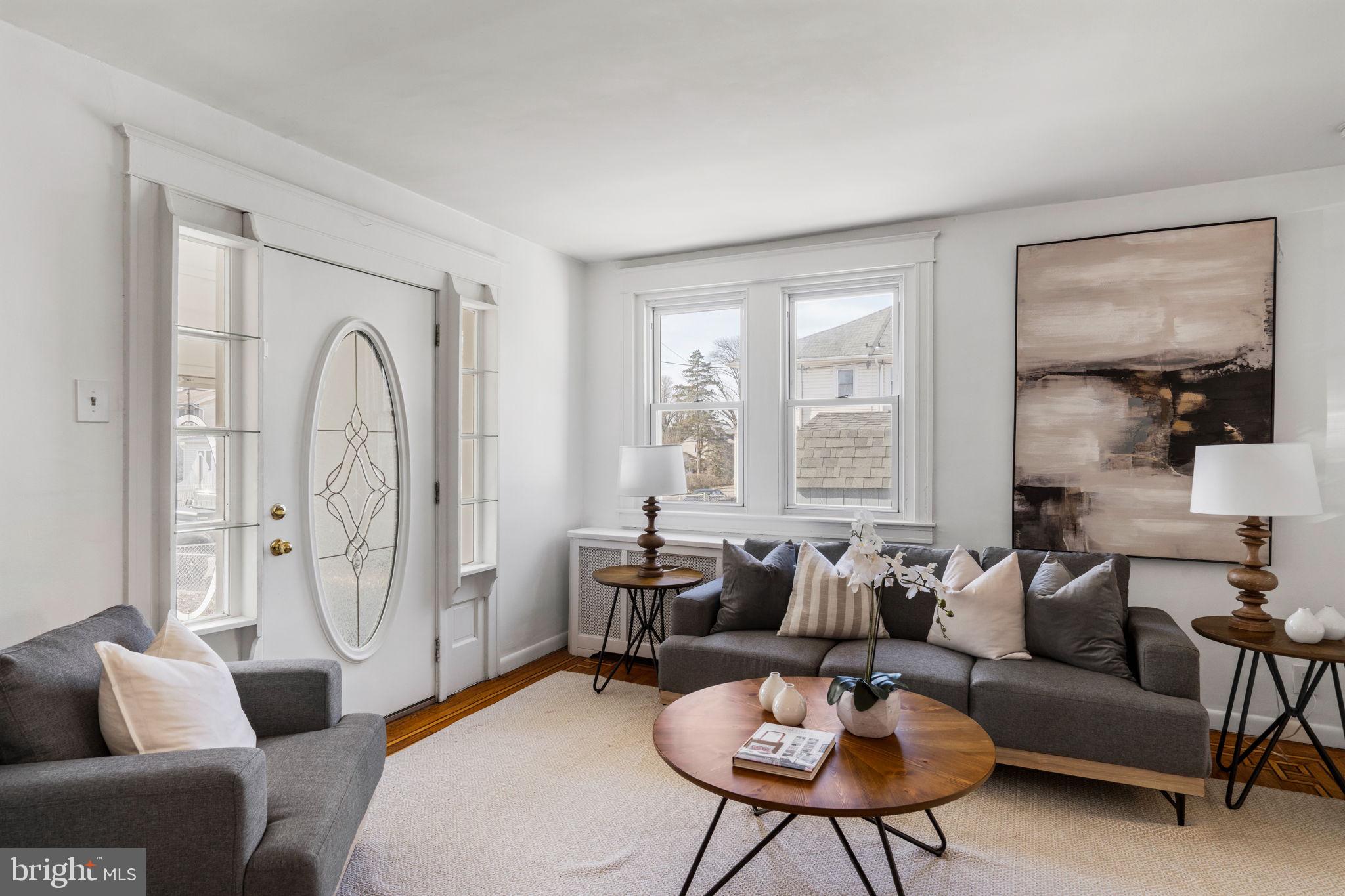 264 Pancoast Avenue Springfield, PA 19064 - Photo 8 of 38 a living room with furniture and a large window