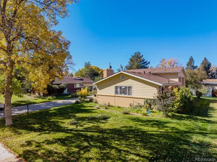 a view of a house with garden