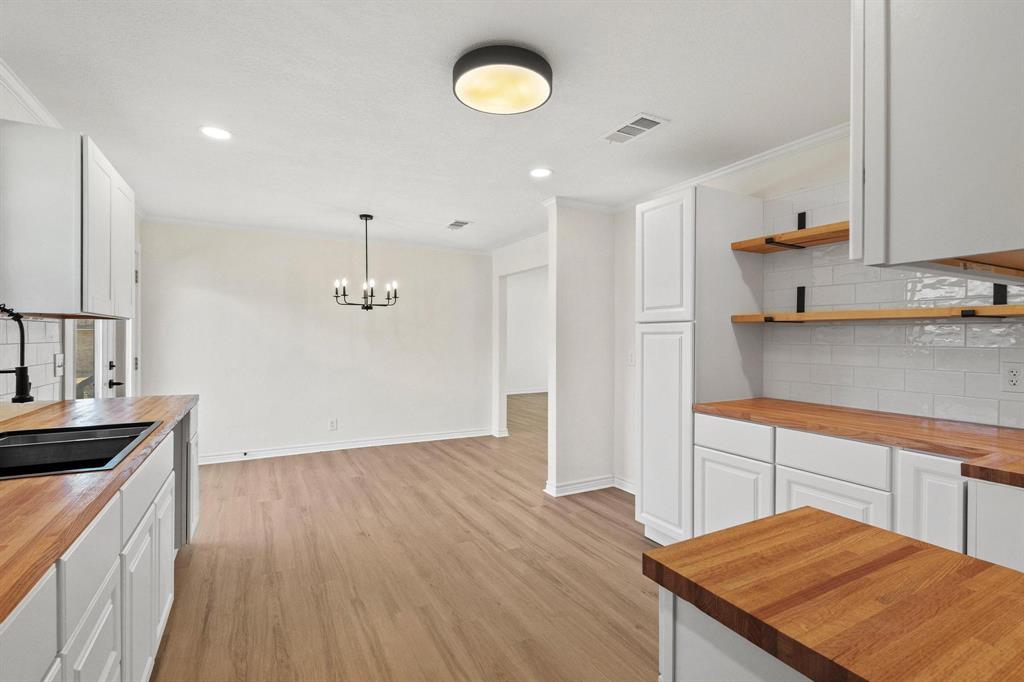 2760 Fm 1897 Bells, TX 75414 - Photo 11 of 34 a kitchen with a sink and a refrigerator