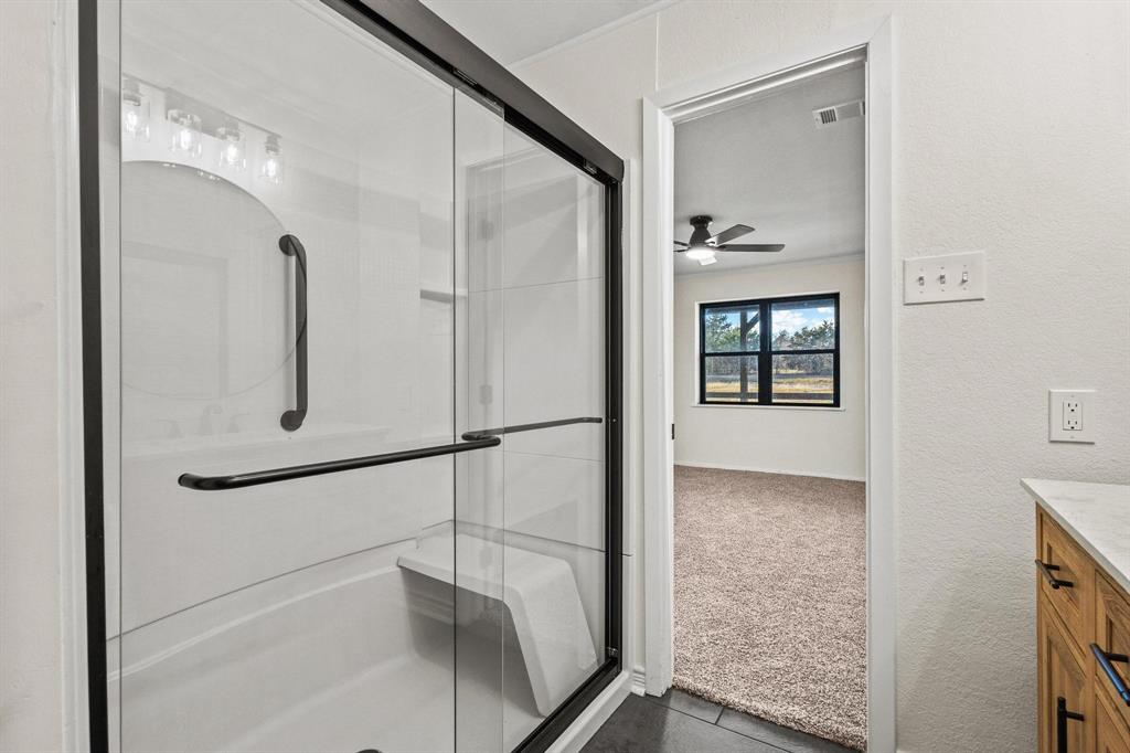 2760 Fm 1897 Bells, TX 75414 - Photo 18 of 34 a bathroom with a shower and a mirror