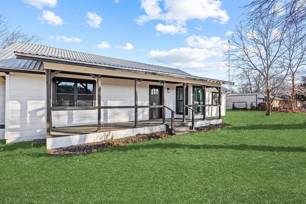 2760 Fm 1897 Bells, TX 75414 - Photo 2 of 34 a front view of house with yard and outdoor seating