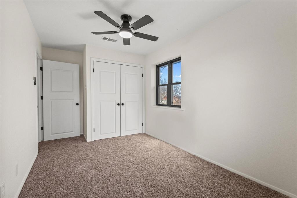 2760 Fm 1897 Bells, TX 75414 - Photo 24 of 34 an empty room with a ceiling fan and a window