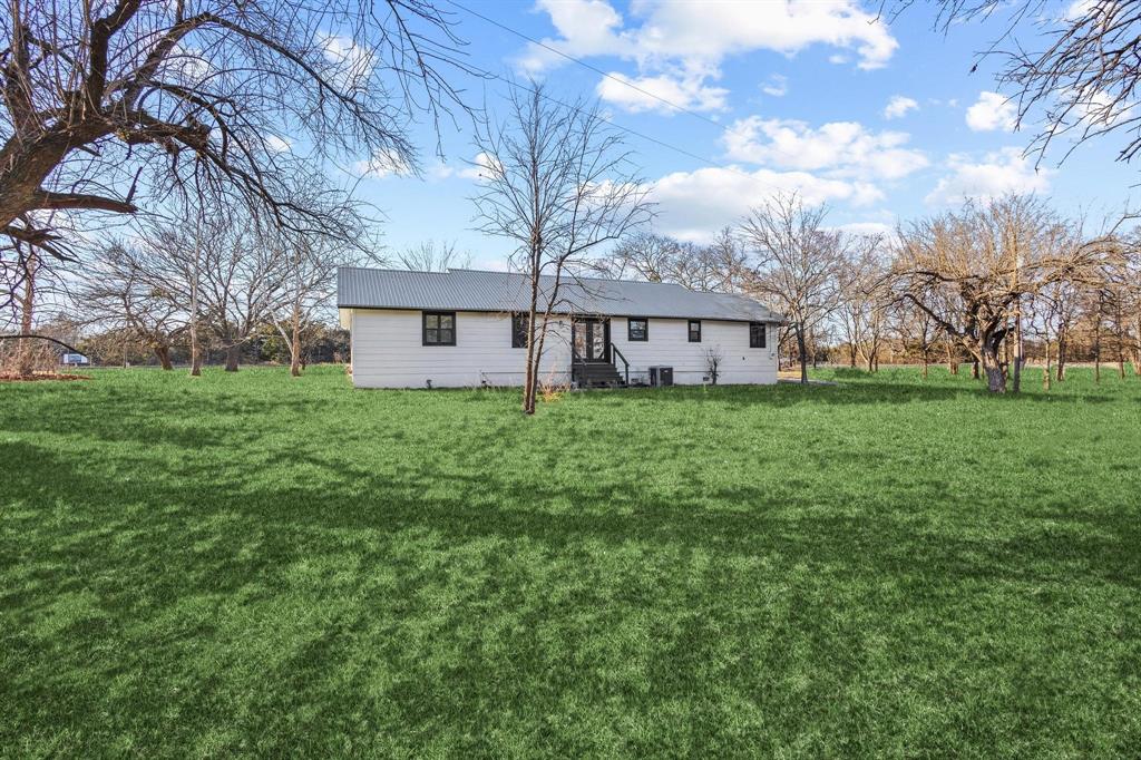2760 Fm 1897 Bells, TX 75414 - Photo 28 of 34 a view of a house with a yard