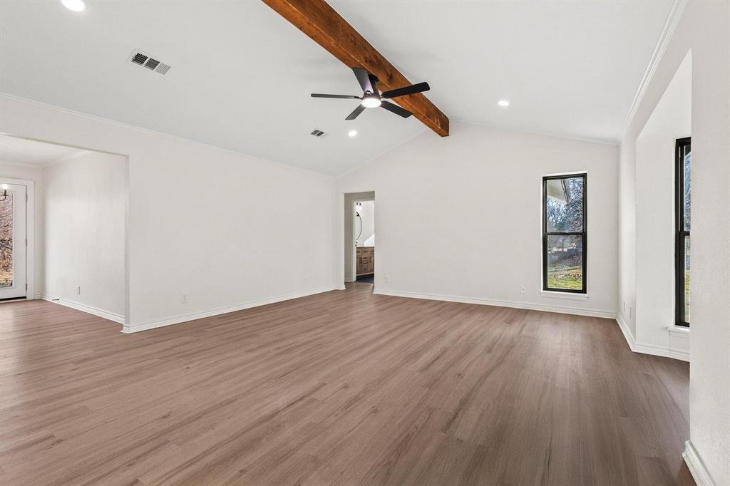 2760 Fm 1897 Bells, TX 75414 - Photo 7 of 34 an empty room with wooden floor and windows
