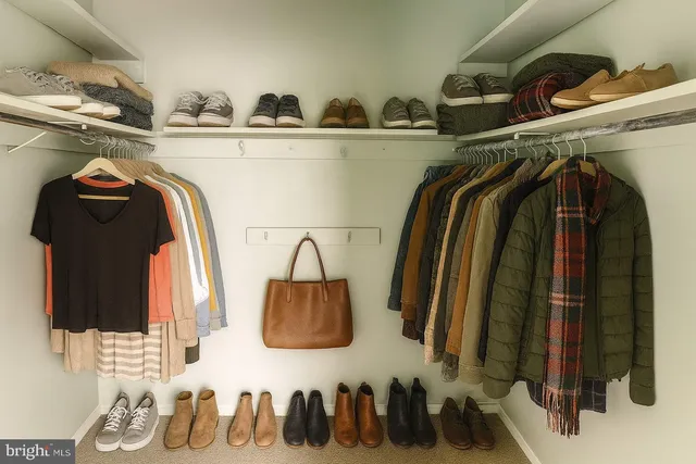 a kitchen with a stove a sink and a microwave