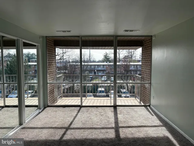 a workspace with furniture and window