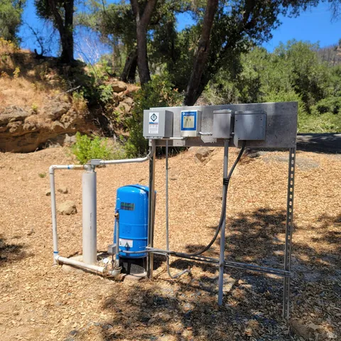 a view of a wooden door and a fire pit