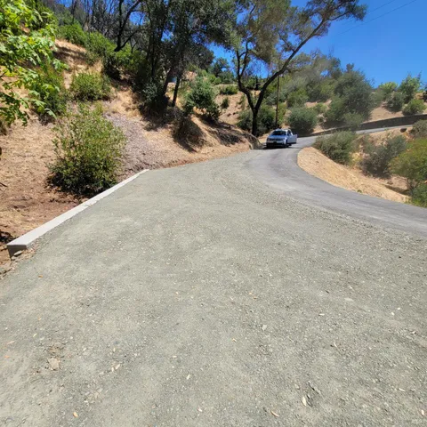 a view of a road with a yard