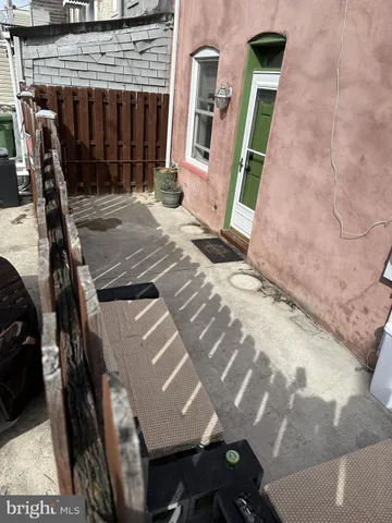 a building with a trees in the background