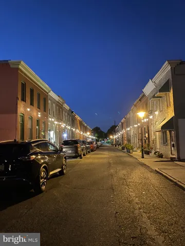 a view of a street with cars