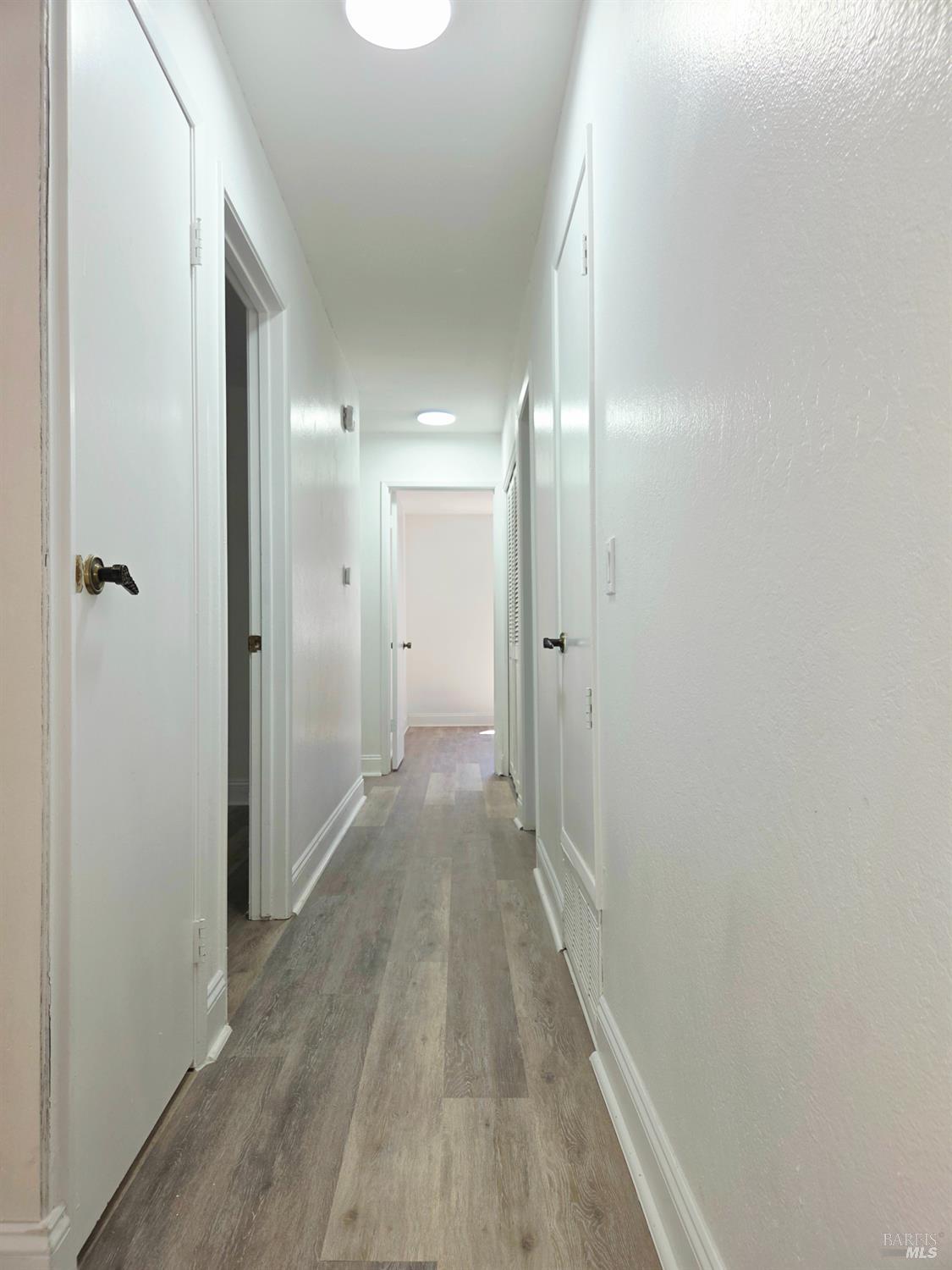140 Del Rio Court, Unit 4 Vacaville, CA 95687 - Photo 11 of 25 a view of a room with wooden floor