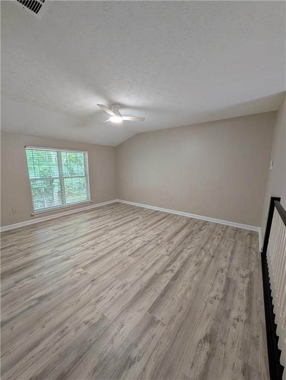 3324 Benthollow Lane Duluth, GA 30096 - Photo 8 of 16 wooden floor in an empty room with a window