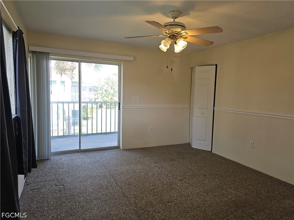 8101 Country Road, Unit 201 Fort Myers, FL 33919 - Photo 20 of 34 a view of an empty room with a window
