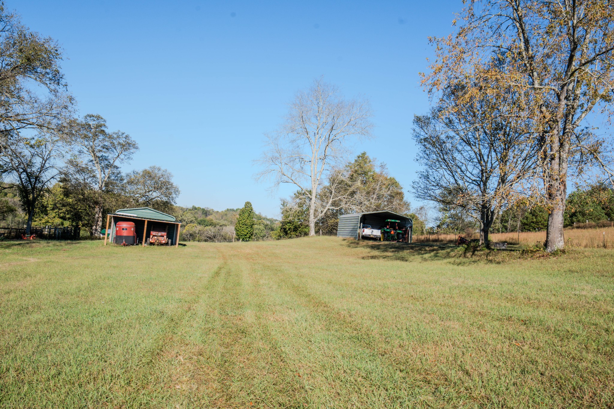 0 Delina Boonshill Road Petersburg, TN 37144 - Photo 33 of 40 a front view of a house with a garden and trees