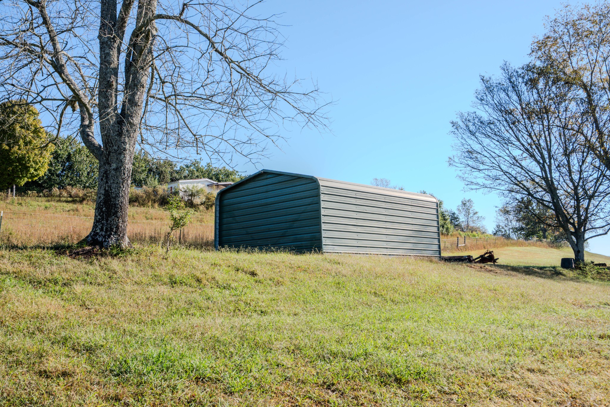 0 Delina Boonshill Road Petersburg, TN 37144 - Photo 35 of 40 a backyard of a house with large trees