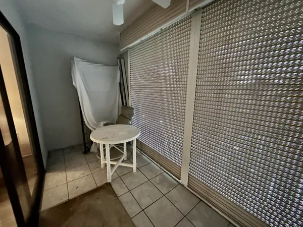 a bathroom with a shower toilet and sink