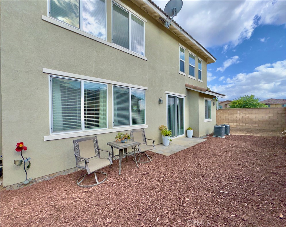 11265 Runyan Road Beaumont, CA 92223 - Photo 99 of 138 a view of a house with backyard and sitting area