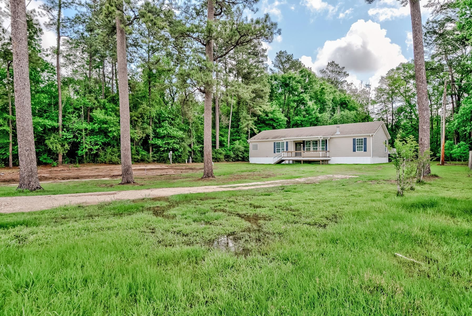 a house view with a sitting space and garden view
