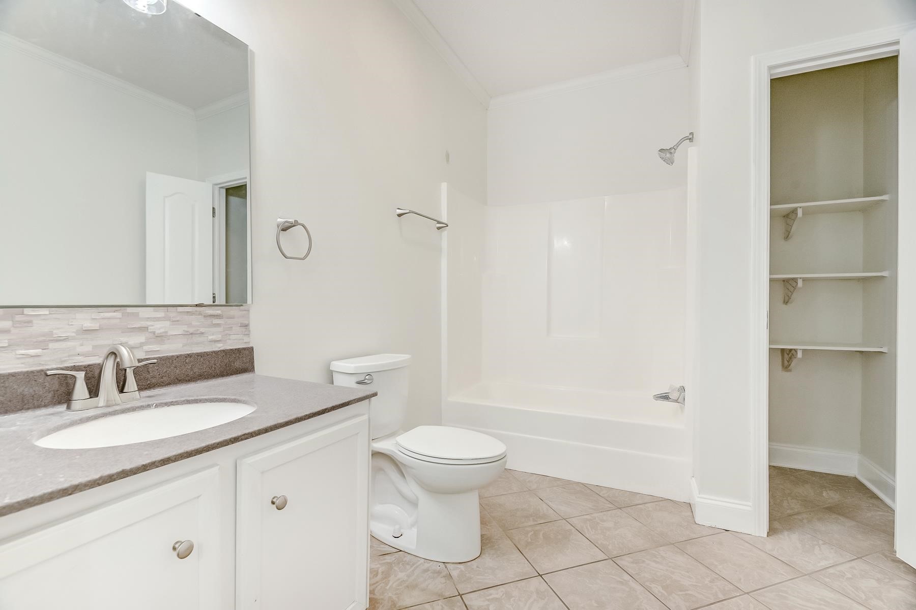 16741 Highway 69 Warren, TX 77664 - Photo 18 of 24 a bathroom with a sink a toilet and shower