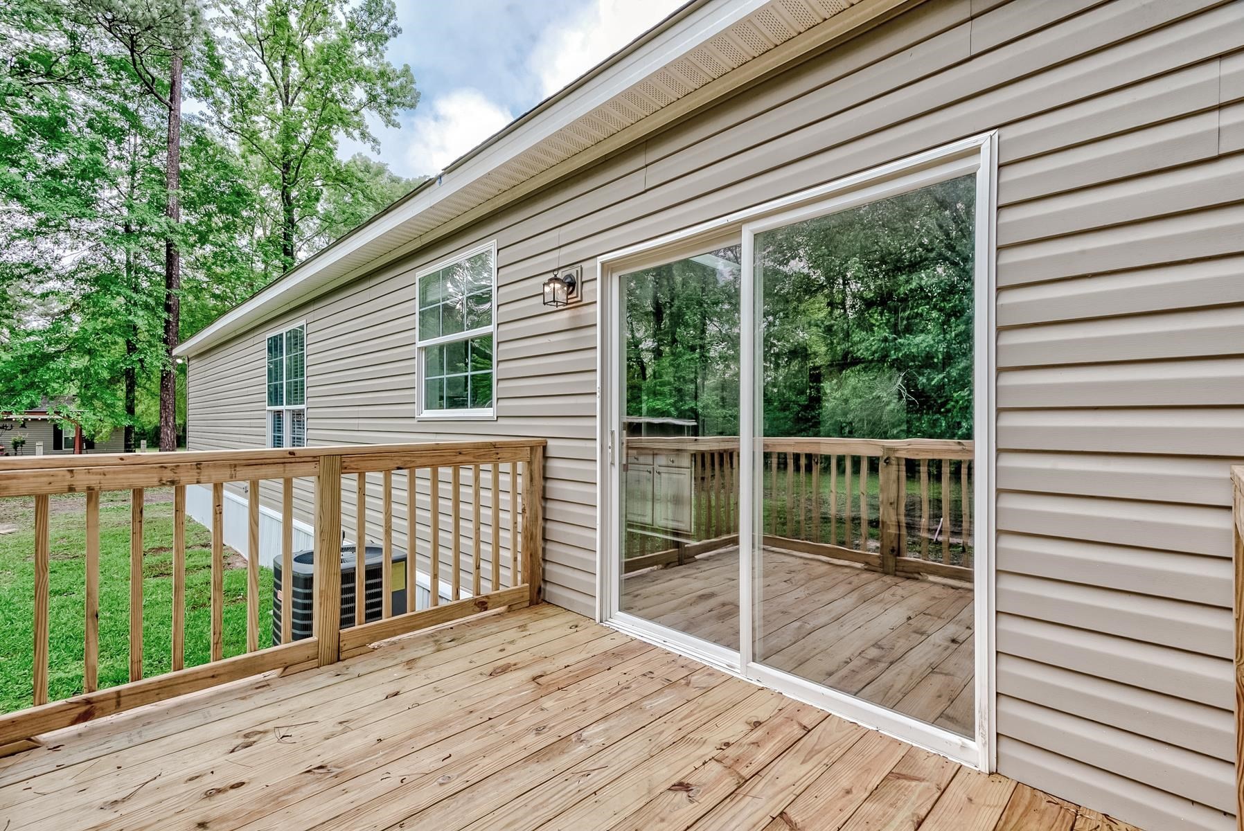 16741 Highway 69 Warren, TX 77664 - Photo 19 of 24 a balcony with wooden floor