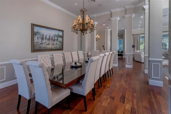 a kitchen with sink cabinets and wooden floor
