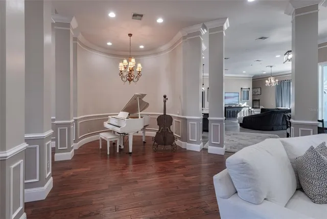 a view of a swimming pool with outdoor seating
