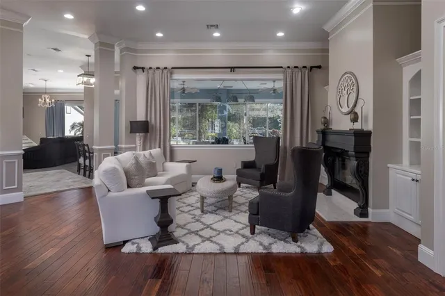 a front view of a house with a garden and yard