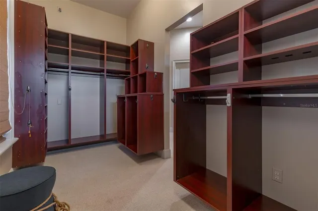 an aerial view of a house with a swimming pool
