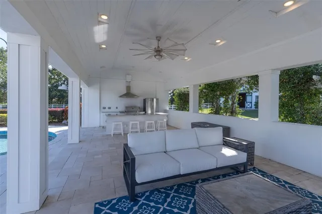 an aerial view of a house with a lake view