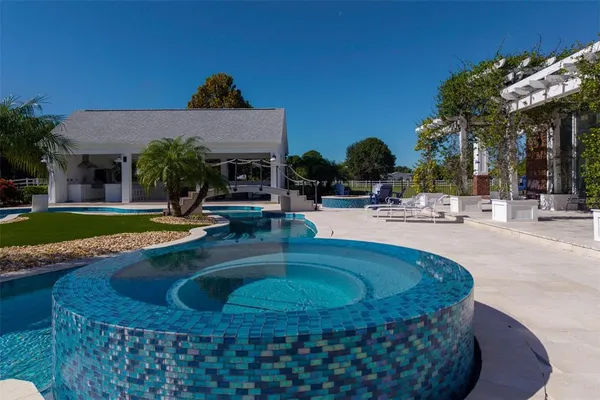 an aerial view of a house with garden space and street view