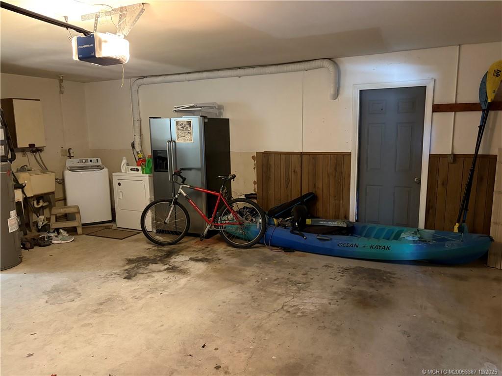 1346 Northwest Pine Ridge Trail Stuart, FL 34994 - Photo 18 of 21 a view of a room with gym equipment