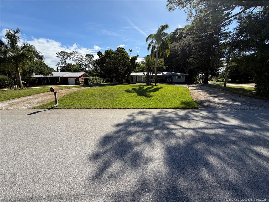 1346 Northwest Pine Ridge Trail Stuart, FL 34994 - Photo 19 of 21 a view of outdoor space yard and green space
