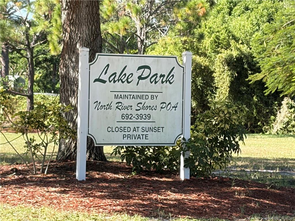 1346 Northwest Pine Ridge Trail Stuart, FL 34994 - Photo 21 of 21 a sign on the side of the road