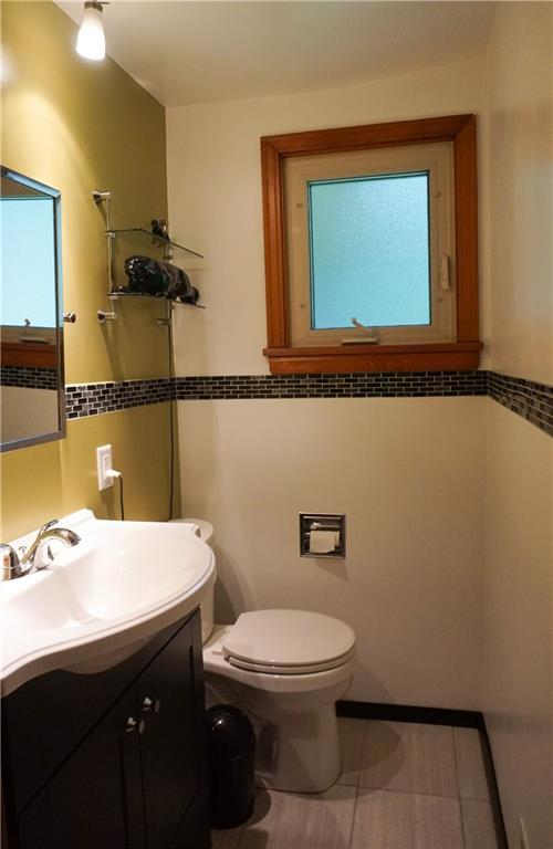 128 Teakwood Road Butler, PA 16001 - Photo 14 of 23 HALF BATH CONVENIETLY LOCATED OFF THE FAMILY ROOM