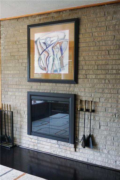 128 Teakwood Road Butler, PA 16001 - Photo 3 of 23 SLEEK BRICK FIREPLACE