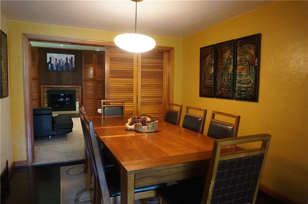 128 Teakwood Road Butler, PA 16001 - Photo 8 of 23 GORGEOUS DINING ROOM THAT LEADS INTO THE FAMILY ROOM THROUGH DOUBLE WOOD SLATTED DOORS