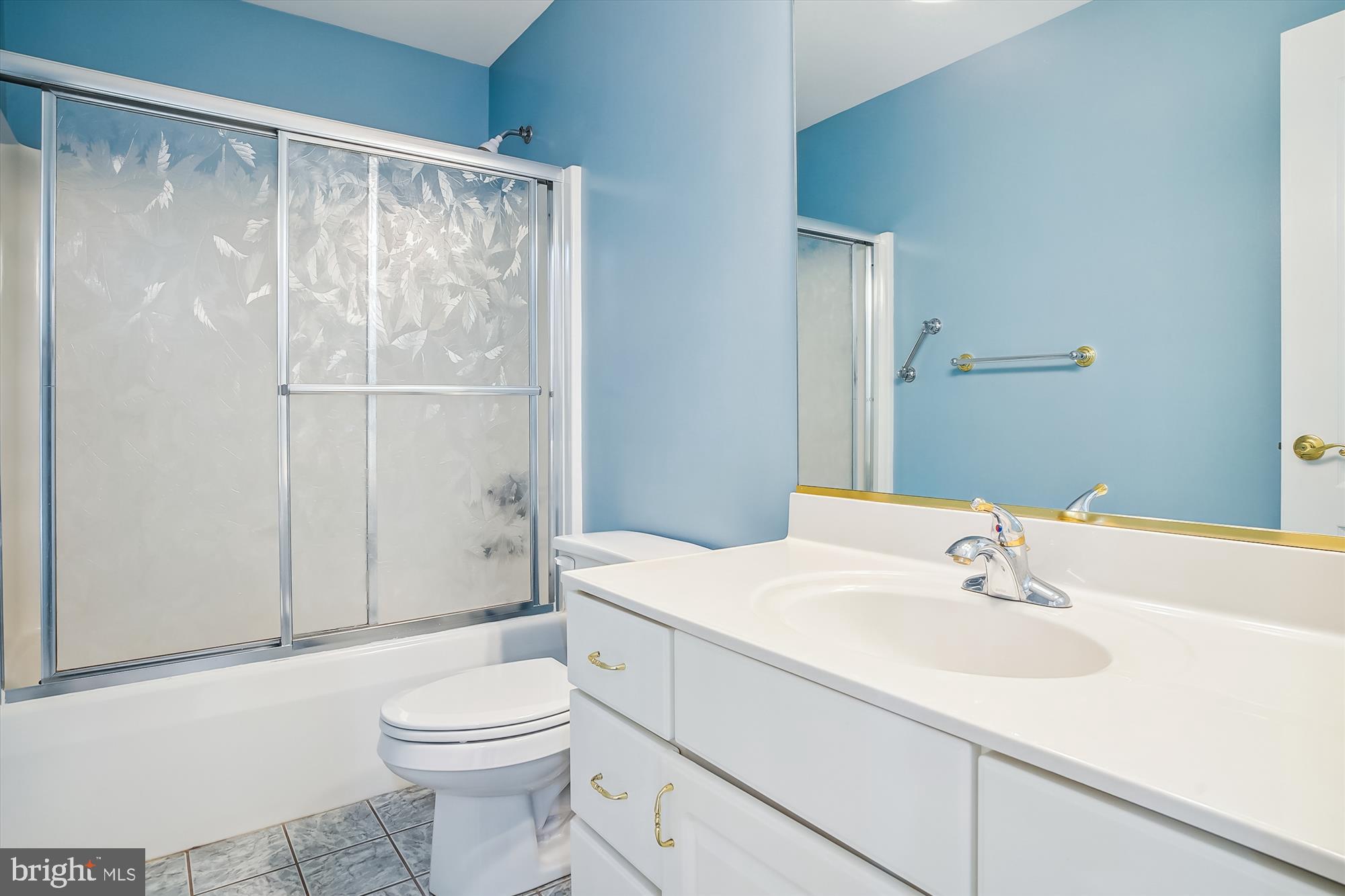 2802 Cox Neck Road Chester, MD 21619 - Photo 29 of 55 a bathroom with a sink toilet and shower